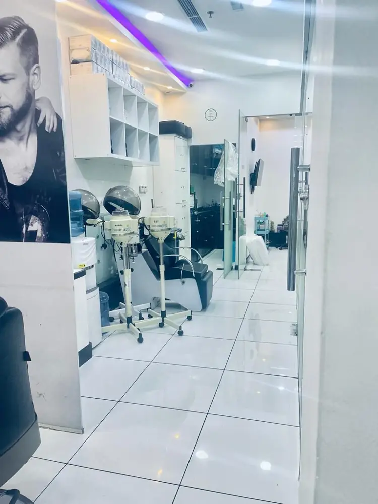 Inside Groom Studio: styling chairs, mirrors and the purple light strip